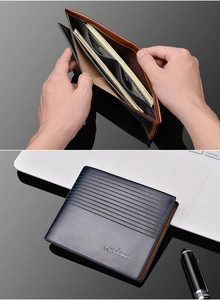 Detail of bifold wallet interior showing high capacity bill compartment and pen