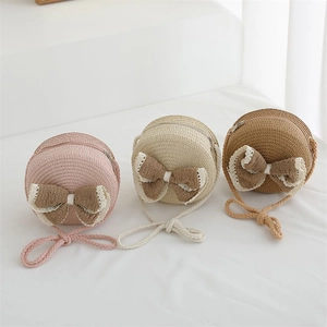 Détails de petits sacs ronds en paille avec dentelle et nœud papillon pour fillettes