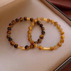 Bracelet En Perles D'Oeil De Tigre Artificiel Avec Pendentif Poisson En Cuivre Doré Style Chinois Vintage Pour Femme