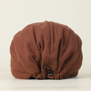 Breathable dark brown linen newsboy cap with adjustable drawstring for a relaxed fit