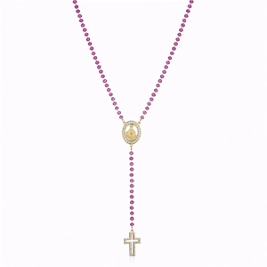 Detail of rosary necklace with rose red beads, virgin mary medal and zircon cross pendant