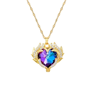 Luxurious gold-plated heart necklace with purple crystal and angel wings pendant