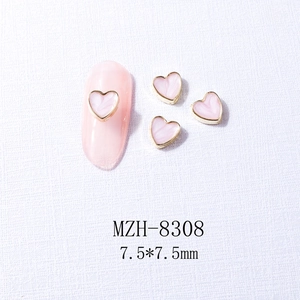 Pink heart nail charms with gold metal edges, 7.5mm size for manicures and DIY art