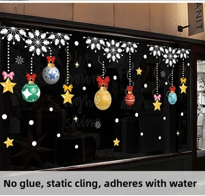 Detail of festive Christmas window stickers featuring colorful ornaments and snowflakes