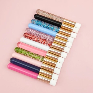 Set of 12 eyelash cleaning brushes with white tips and sparkling colorful handles