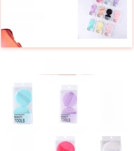 Detail view of microfiber makeup powder puff set in various colors with ribbon handles