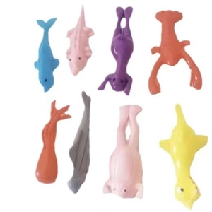 Set of 8 colorful plastic marine and amphibian animal toy models on white background