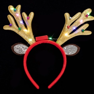 Macro shot of reindeer horn headband with LED lights and golden glitter finish