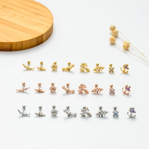 Assorted stainless steel stud earrings in gold, rose gold and silver with zircon accents