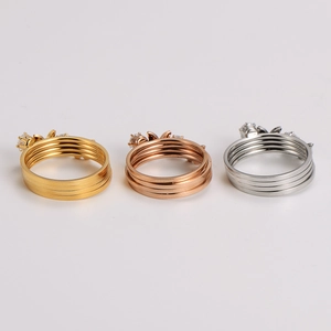 Set of three butterfly rings in gold rose gold and silver finish with sparkling stones