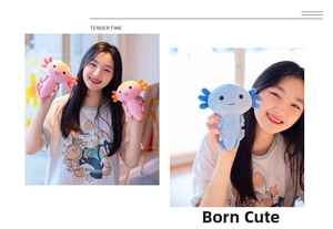 Pink and blue axolotl plush toys held by a model showing soft texture and size