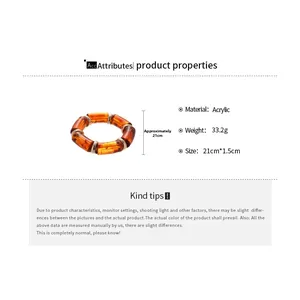Detail view of the amber acrylic elastic bracelet showing marble texture and 21cm length
