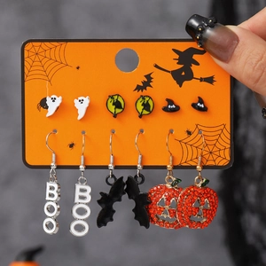 Set of 6 Halloween stud earrings with ghost, bat, and pumpkin designs on orange card