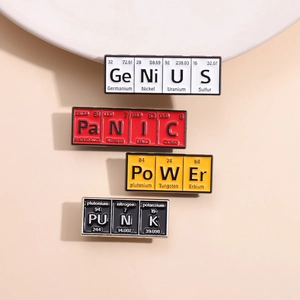 Set of chemistry periodic table enamel pins with Genius Panic Power and Punk text