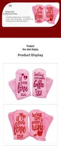 Detail of pink coral fleece thermal socks with non-slip slogans and coffee icons