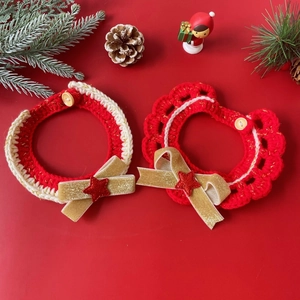 Festive red and white knitted pet collar with gold bow and bell for cats and small dogs