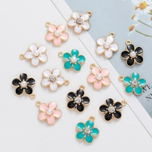 Detailed view of colorful enamel six-petal flower alloy pendants with pearl center