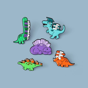 Detailed set of 5 colorful enamel dinosaur pins with academic books and graduation cap