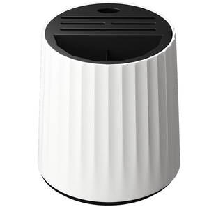 White rotating kitchen knife block holder with vertical stripes and black tool slots