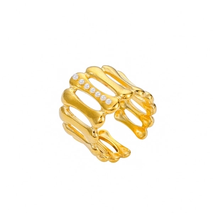 Close-up of 18K gold-plated hollow line ring with white pearls on a minimalist band