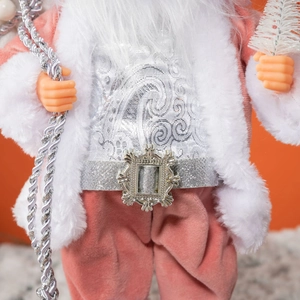Pink velvet Santa Claus figurine with silver belt and miniature white tree decoration