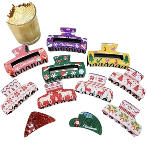 Christmas hair claw clips set featuring Santa, reindeer and snowflake motifs on white background