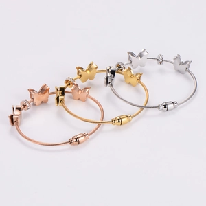 Three-color steel cable bracelets with zircon butterfly pendants in gold and silver finish