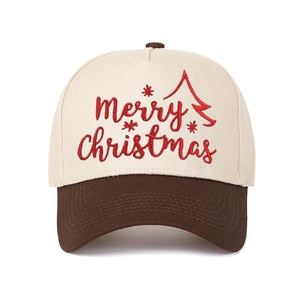 Close-up of red Merry Christmas embroidery and stitching on a two-tone trucker cap