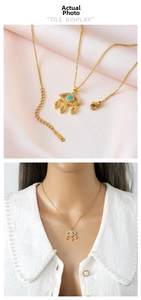 Detailed view of gold Evil Eye necklace with blue stone and S925 sterling silver chain