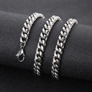 Polished stainless steel Cuban link necklace for men and women on a premium display stand