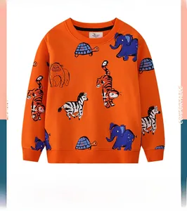Detail of bright orange children's sweatshirt with colorful cartoon animal prints