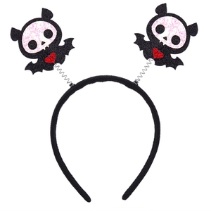 Halloween bat headband with spring-loaded glitter bats and red heart details on white background