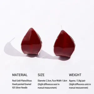 Deep red enamel leaf-shaped C-shaped stud earrings in gold-plated brass for women
