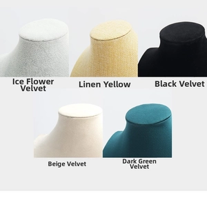 Macro details of premium necklace bust displays in velvet, linen and crushed ice fabrics