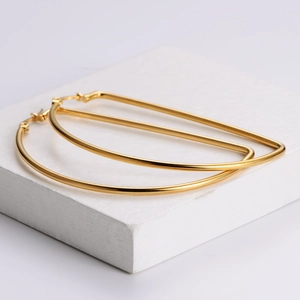 Minimalist gold D-shaped geometric hoop earrings in polished stainless steel for women