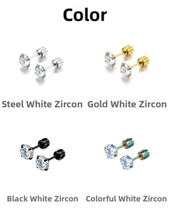 Détail de boucles d'oreilles à vis en acier, or, noir et arc-en-ciel avec zircons blancs