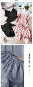 Detail of silk satin camisole set showing waist drawstring and ruffled hem texture