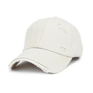 Detailed view of beige cotton baseball cap featuring vintage distressed ripped holes