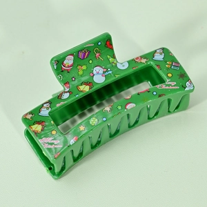 Green Christmas hair claw clip with festive Santa and snowman patterns for women