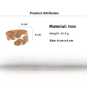 Detailed size specifications of the gold metal leaf cuff bracelet in a macro view