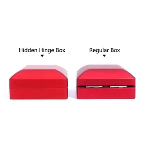 Red LED jewelry ring box comparison showing hidden hinge versus standard hinge design