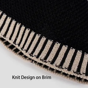 Fashionable black striped knit bucket hat featuring a textured brim and modern design
