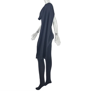 Side view of black sleeveless jumpsuit featuring unique shoulder cape and slim fit design