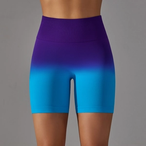 Detail of high-waist seamless sports shorts with purple and blue gradient knit texture