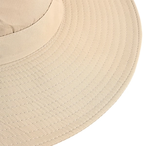 Detail of multi-row stitching on the wide brim of a breathable beige sun hat