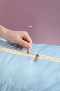 Detail of smooth double metal zippers on thick Oxford cloth nursery storage bag