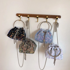 Sequin drawstring bucket bags with metal ring handles and chain straps in four colors