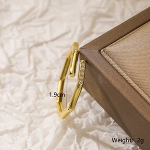 Macro detail of 18K gold plated bamboo ring with pavé zircons showing 1.9cm inner diameter