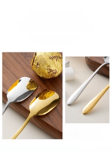 Detail of mirror-polished rose gold stainless steel square spoons with smooth handles
