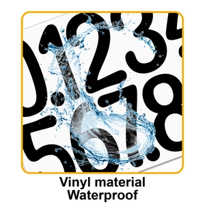 Close-up of 4-inch vinyl number stickers showing waterproof material with splashing water
